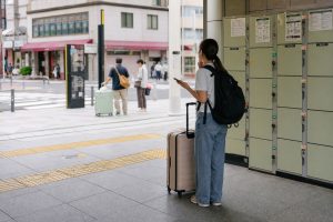 Coin lockers and luggage near an Asakusa station exit