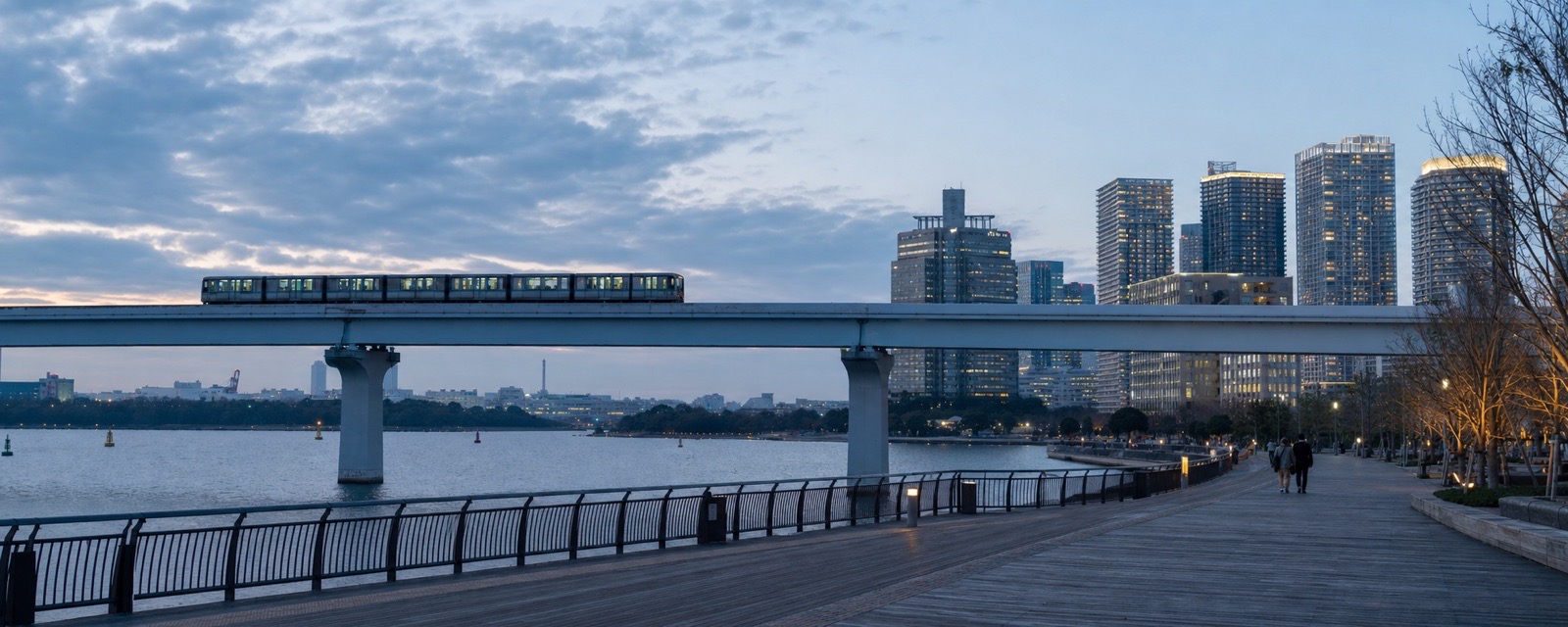 Odaiba waterfront with Yurikamome transit at blue hour
